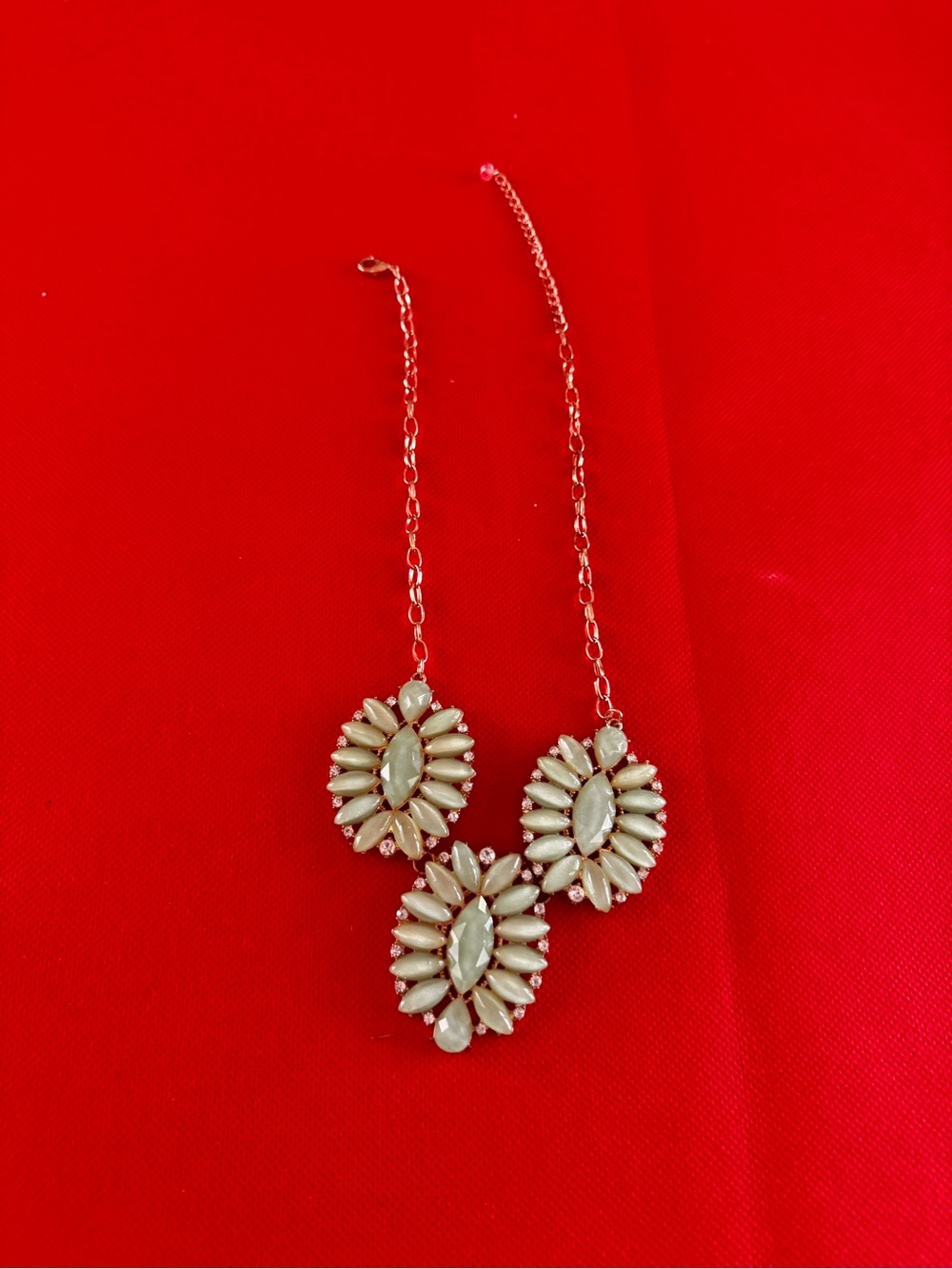 three stone light sage colored necklace